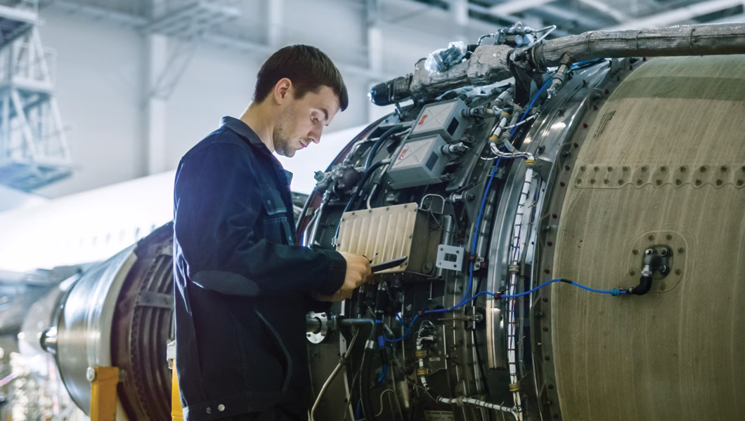 An engineer doing aircraft maintenance